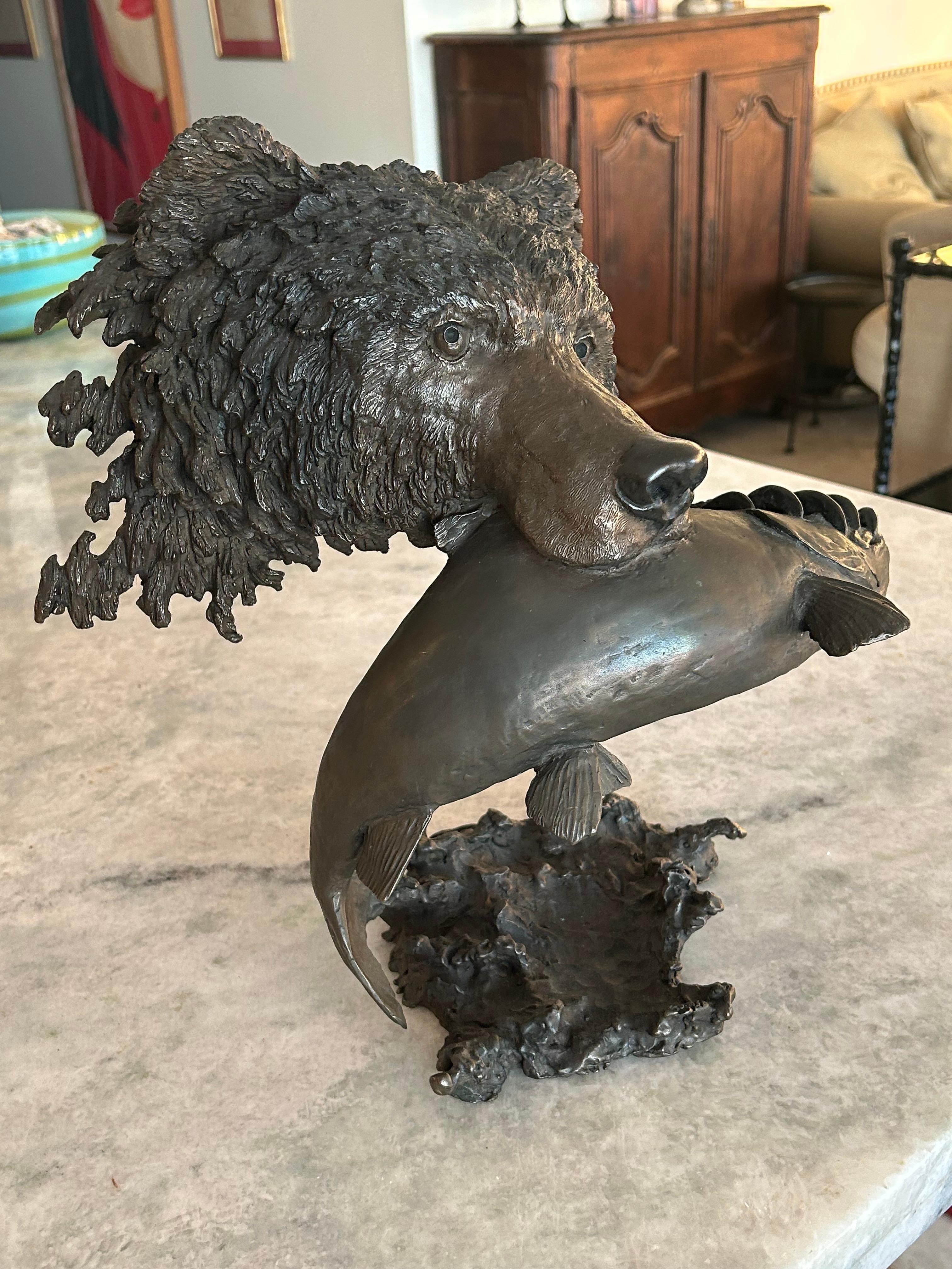 Mark Hopkins, bronze titled “Fishing Grizzly”.grizzly bear with rainbow trout 5