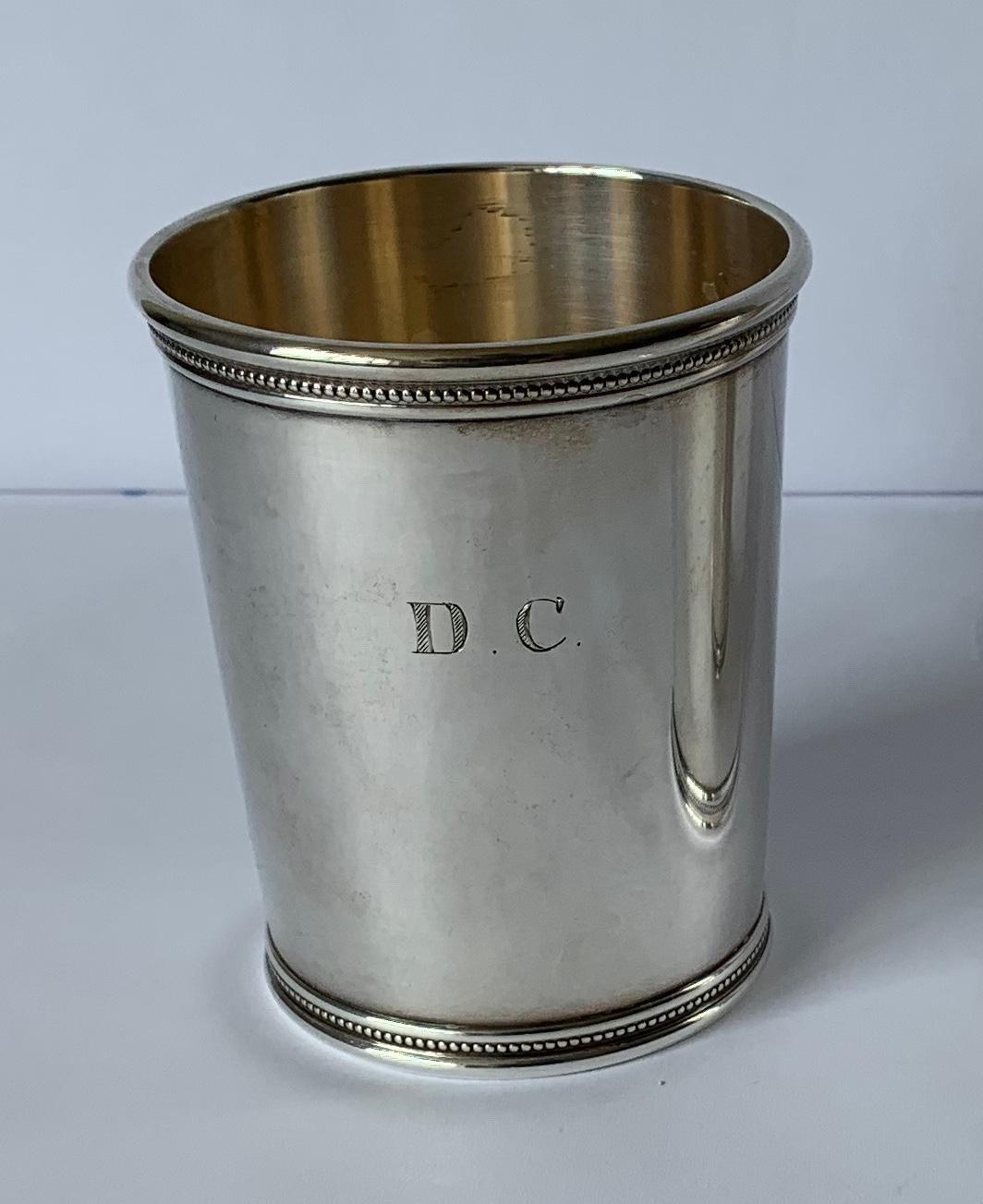 Mark Scearce LBJ 1960s sterling silver julep cup. Stamped on the underside. Gold washed interior. Cup is hand engraved with monogramed D.C. 
Cup comes with flannel storage bag.