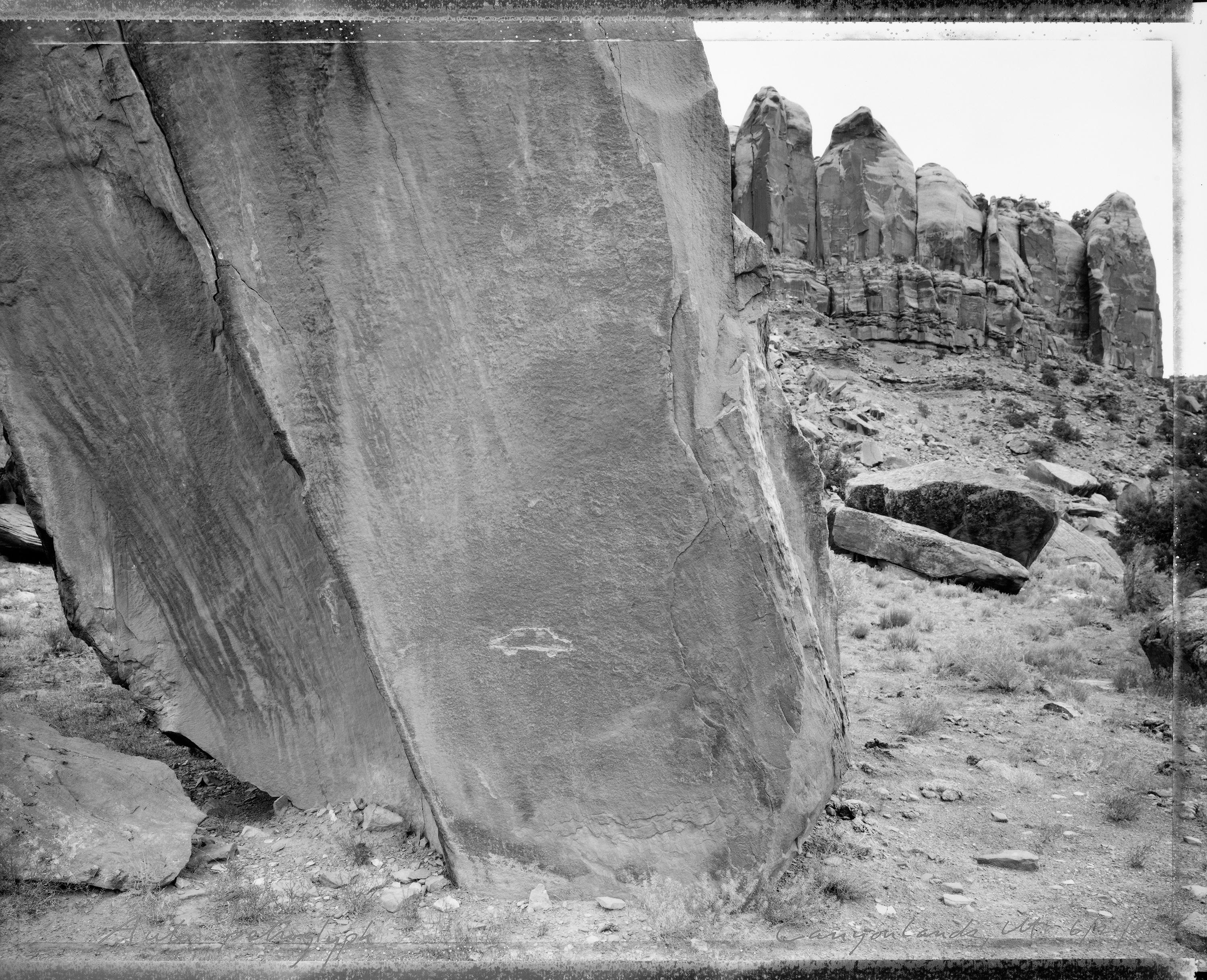 Mark Klett Black and White Photograph - Auto petroglyph, Canyonlands, UT, 6/21/89