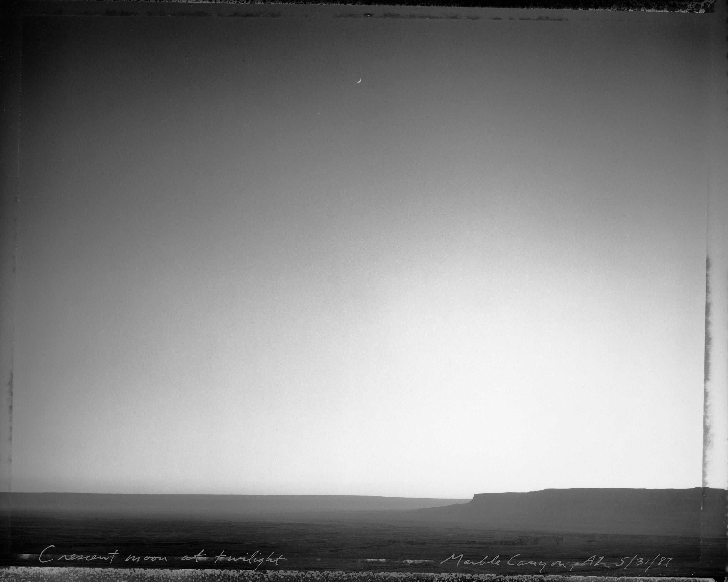 Mark Klett Black and White Photograph - Crescent moon at twighlight, Marble Canyon, AZ, 5/31/87