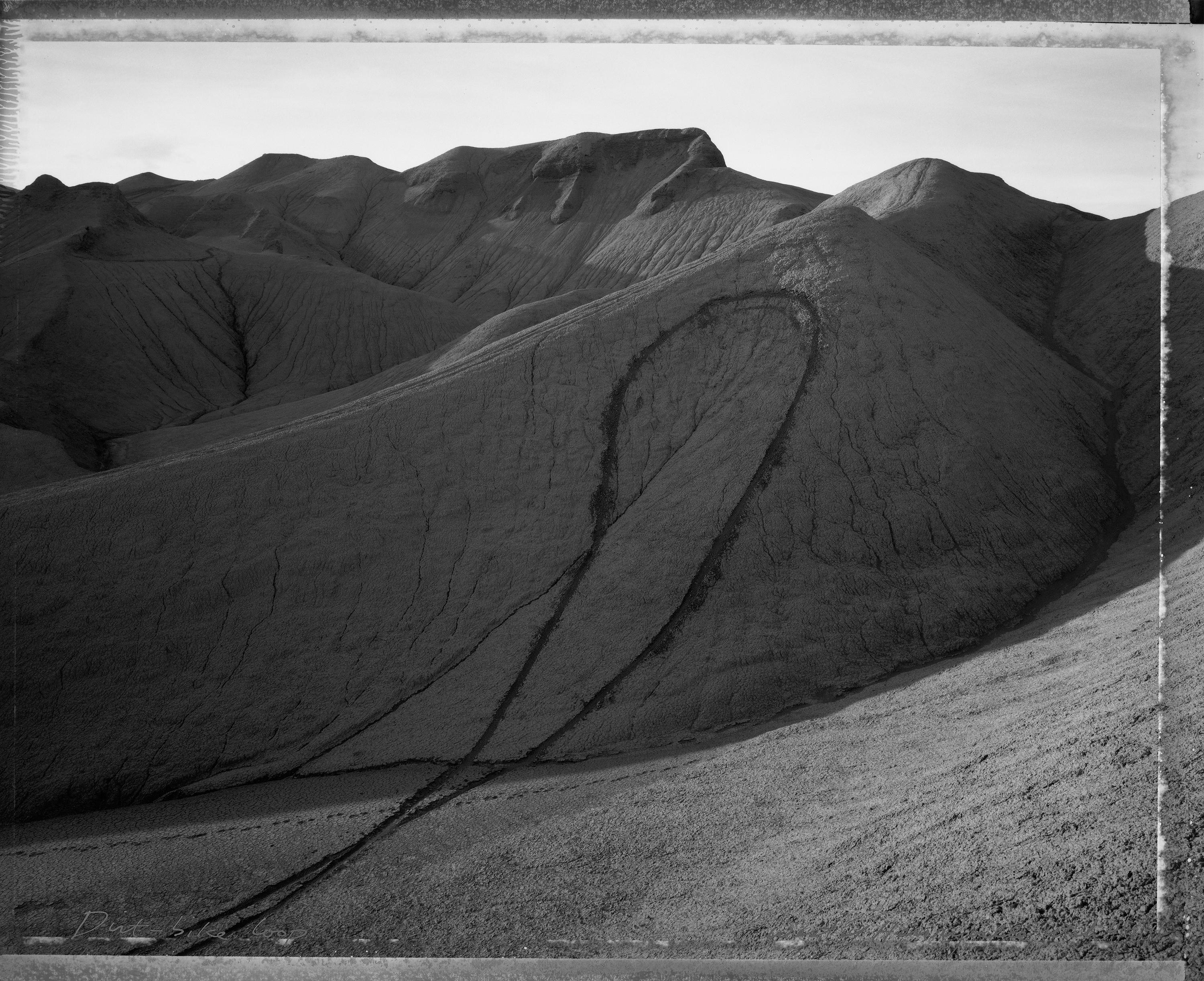 Mark Klett Landscape Photograph - Dirt bike loop, west of Henryville, Utah, 4/18/91 