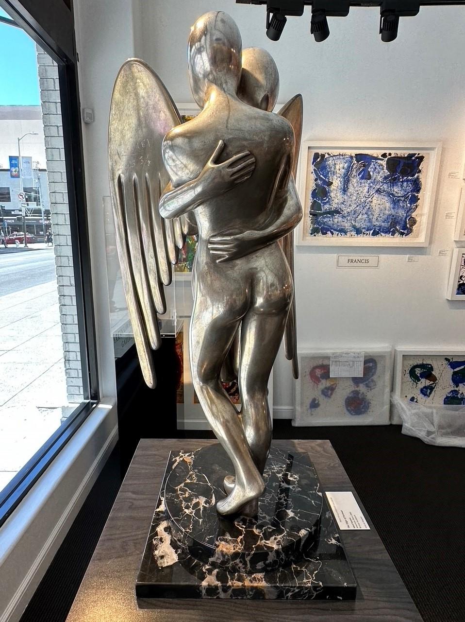 The Edge of Forever is a sculpture in bronze, signed and dated ‘KOSTABI 2023,’ and numbered 3/8 from the edition of nine on one of the angel’s wings (there was also 1 AP). 

Mark Kostabi is widely known for his paintings, but the artist has also
