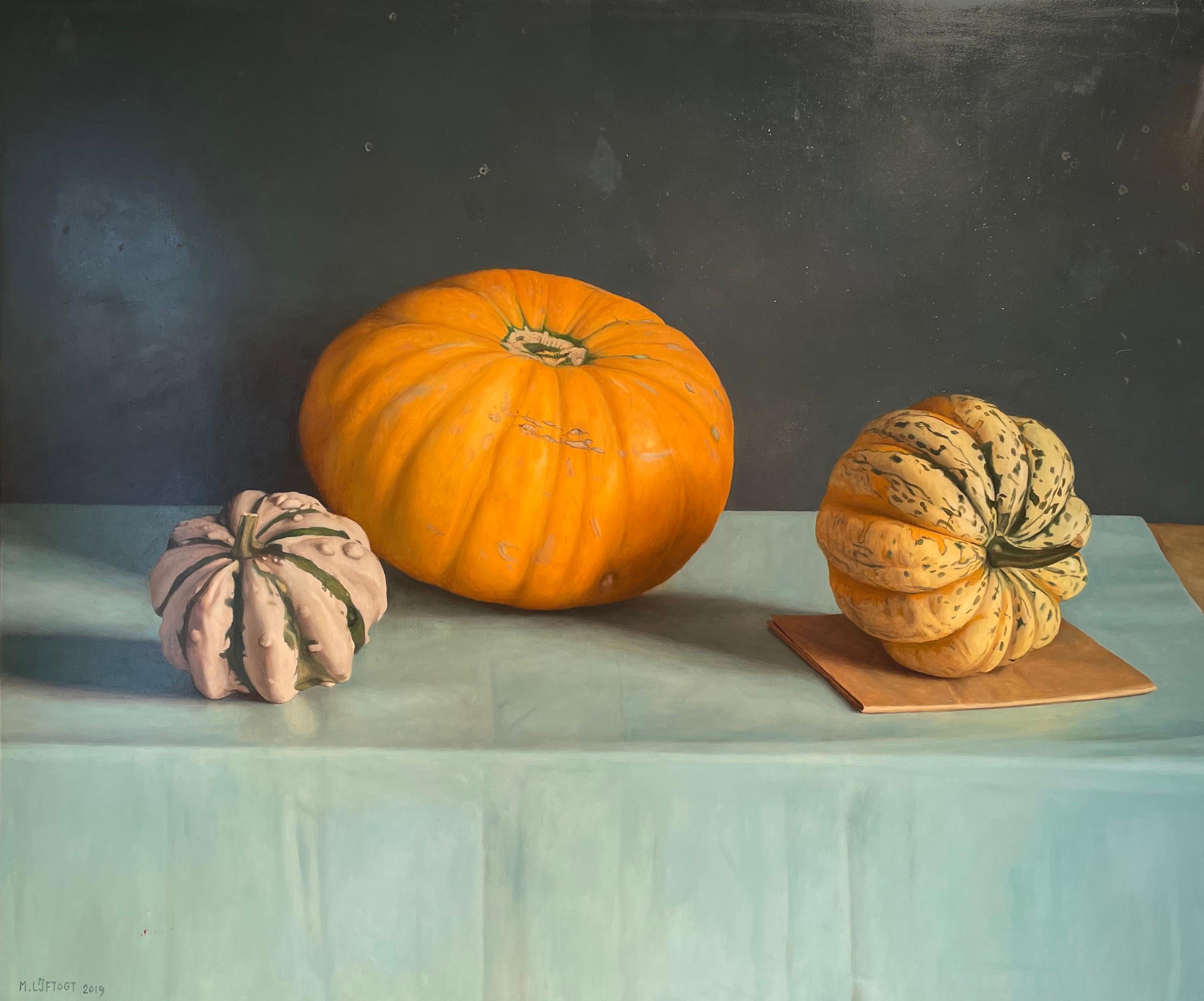 'Orange Pumpkin' Photorealist painting of pumpkins, on a blue, teal cloth - Painting by Mark Lijftogt