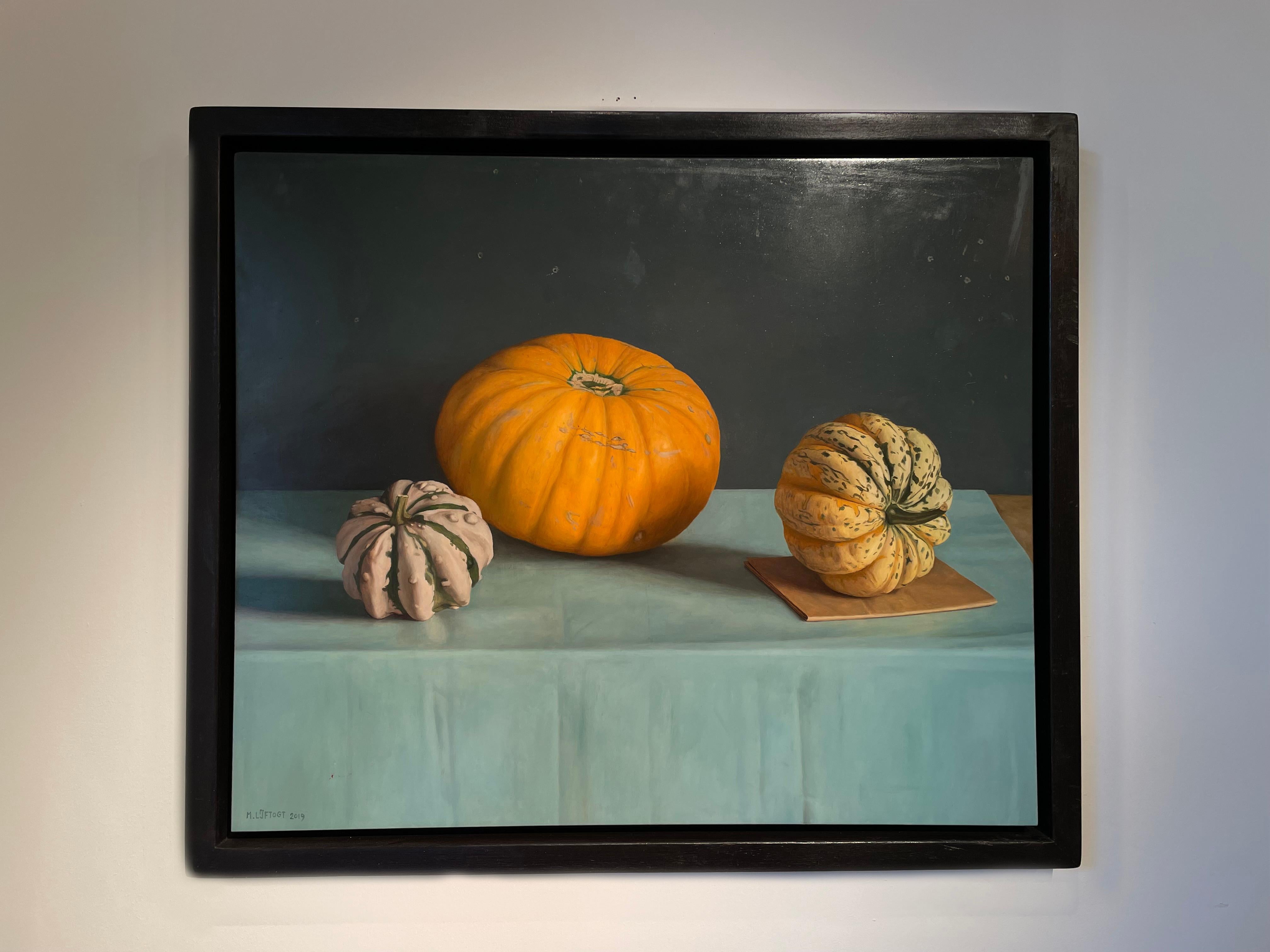 Mark Lijftogt Still-Life Painting - 'Orange Pumpkin' Photorealist painting of pumpkins, on a blue, teal cloth