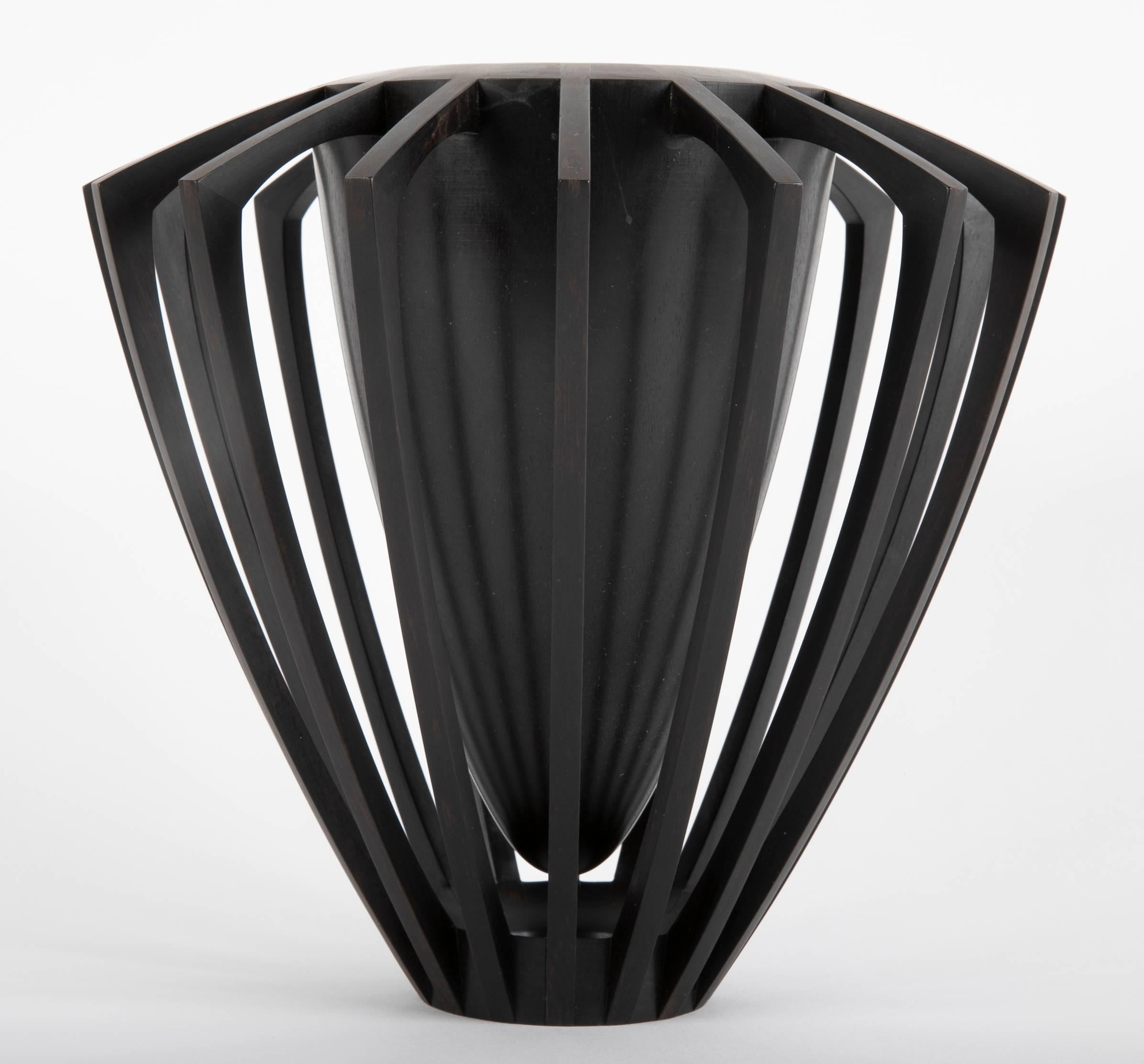 An ebony vase / sculpture made by Mark Nantz. Titled 