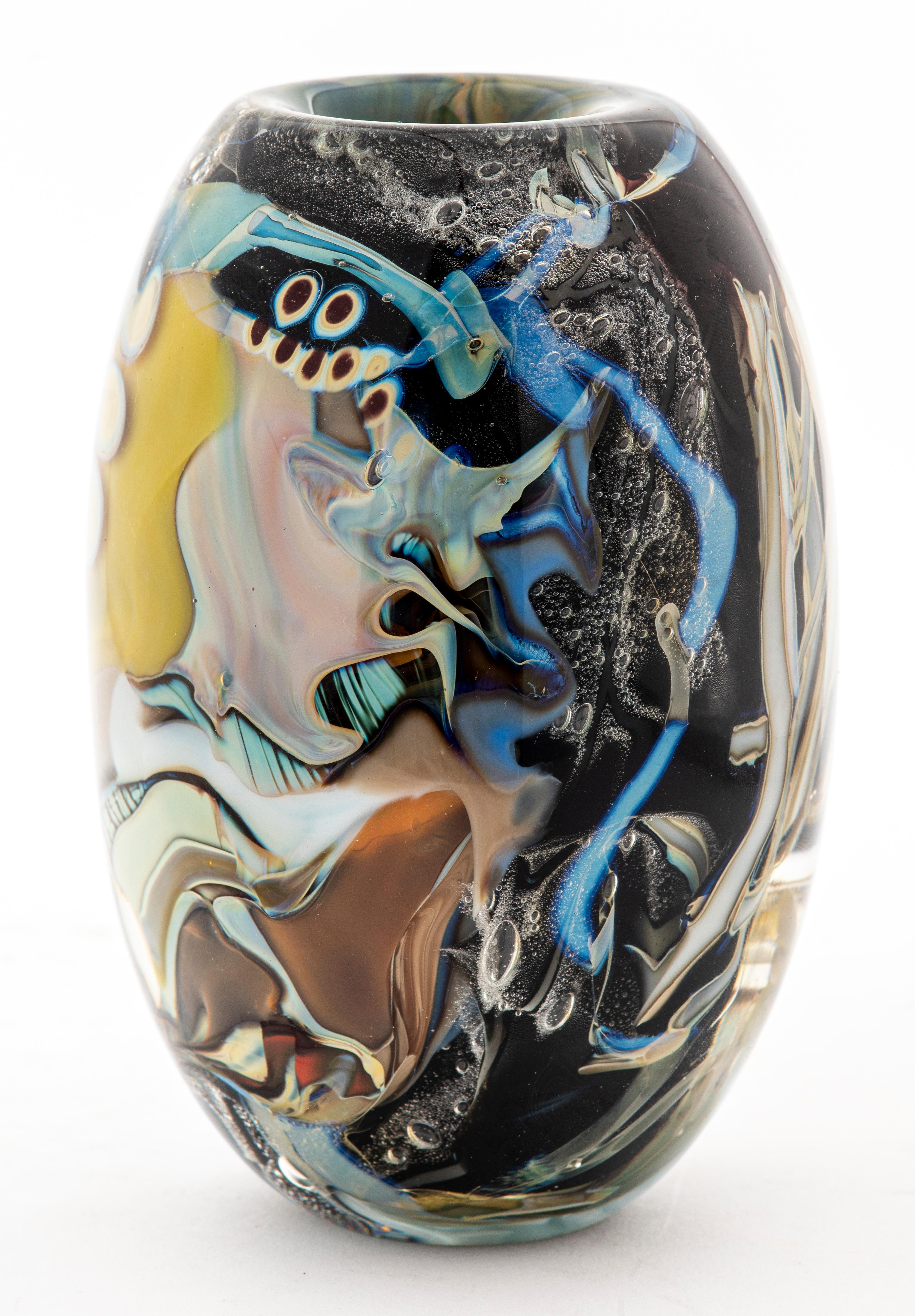 Mark Russell abstract contemporary art glass vase in layered and cased multicolored glass, with incised signature on the bottom and numbered 1/80. 6.25