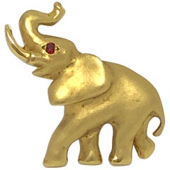 Vintage Mark Schneider 18 Karat Yellow Gold and Ruby Elephant Brooch