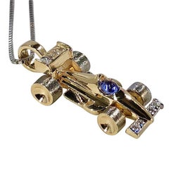 Mark Schneider Limited Creation 14 Karat Diamond and Tanzanite Indy Car Pendant