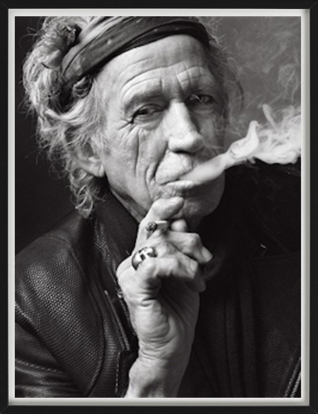 Keith Richards smoking, Black and White Portrait photgraphed by Mark Seliger. 

All prints are limited edition. Available in multiple sizes. High-end framing on request.

All prints are done and signed by the artist. The collector receives an