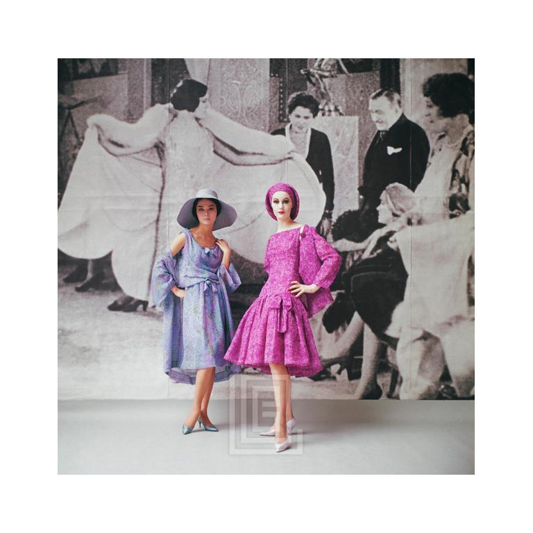 Mark Shaw Color Photograph - 1920’s Backdrop, Two Models Blue and Pink by Dior, 1961