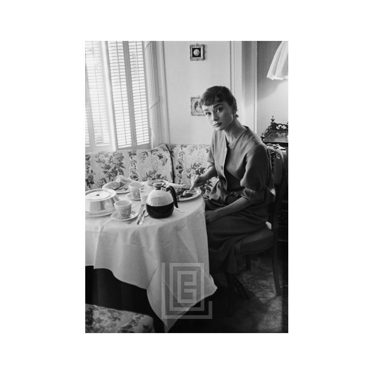 Mark Shaw Black and White Photograph - Audrey Hepburn Breakfast, Looking Up, 1953