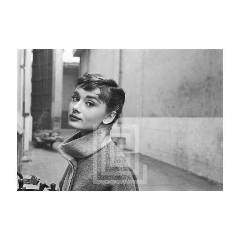 Mark Shaw Black and White Photograph - Audrey Hepburn in Grey Turtleneck Sweater, Glances Left Chin Up, 1953