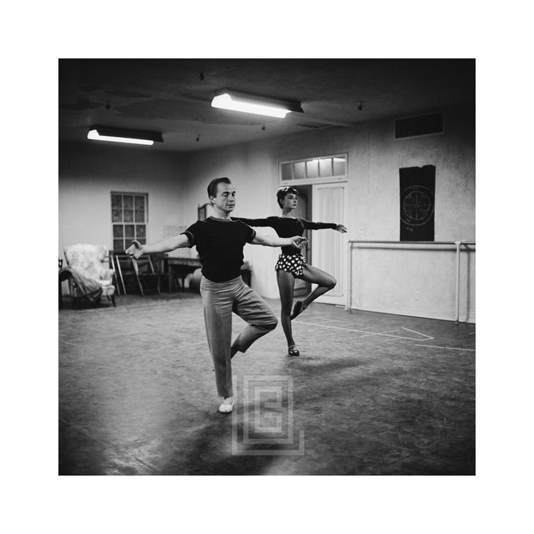 Mark Shaw Figurative Photograph - Audrey Hepburn in the Ballet Studio, 1953
