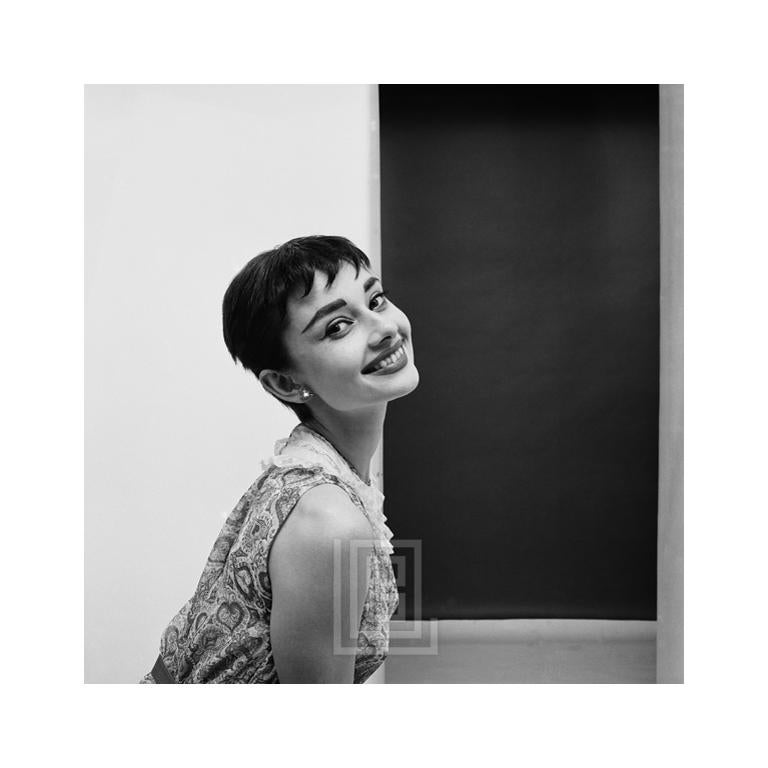 Mark Shaw Black and White Photograph - Audrey Hepburn Smiling, Center Frame, 1954