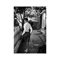Retro Audrey Hepburn Walking Away and Looking Back, 1953
