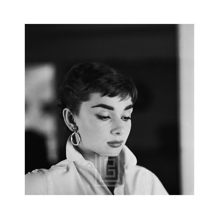 Mark Shaw Black and White Photograph - Audrey Hepburn White Shirt Portrait, Glances Down, 1954