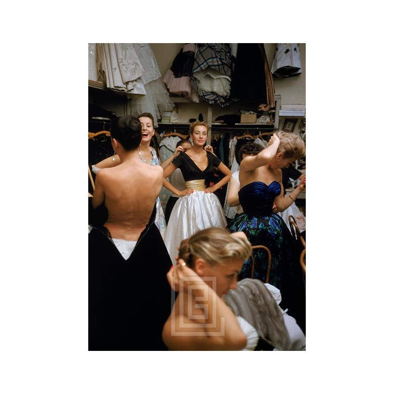 Mark Shaw Color Photograph - Backstage Balmain Black Top White Skirt, 1954