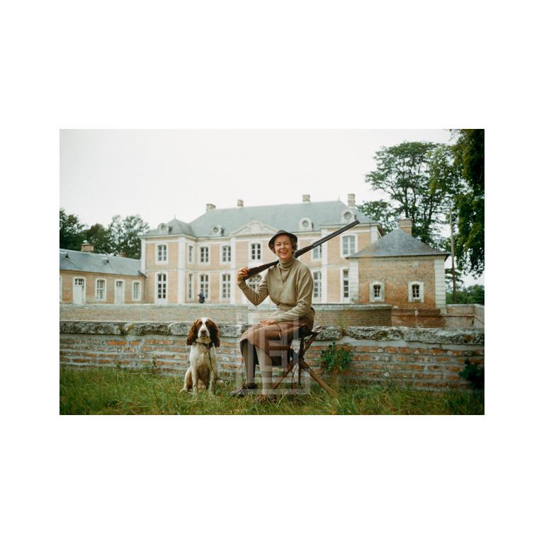Mark Shaw Figurative Photograph - Chateaux, Mme. Rigaud with Springer Spaniels, 1957