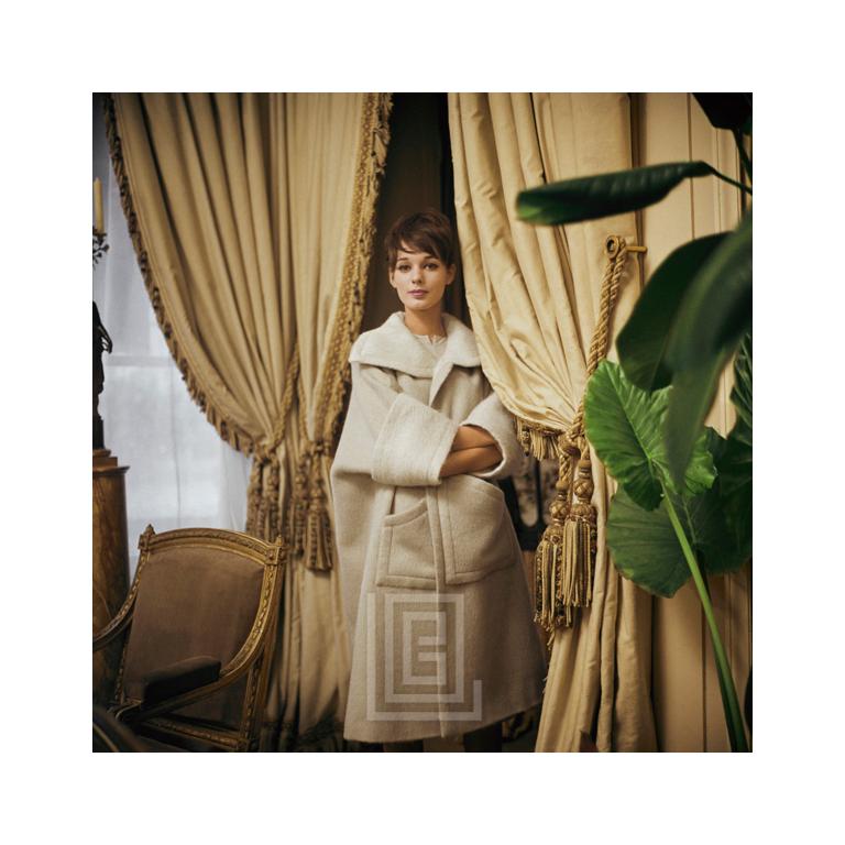 Mark Shaw Figurative Photograph - Designer's Homes, Dior Beige Coat, 1960
