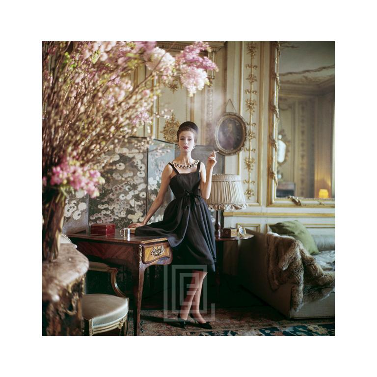 Mark Shaw Color Photograph - Designer's Homes, Dior Smoking Black Dress, 1960