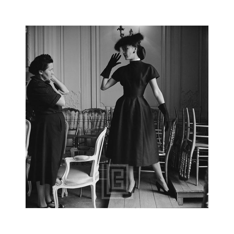 Mark Shaw Figurative Photograph - Dior, Alla in Croque-mitaine with Seamstress, 1953