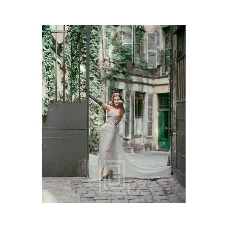 Mark Shaw Color Photograph - Dior Gray Chiffon in Courtyard, 1955