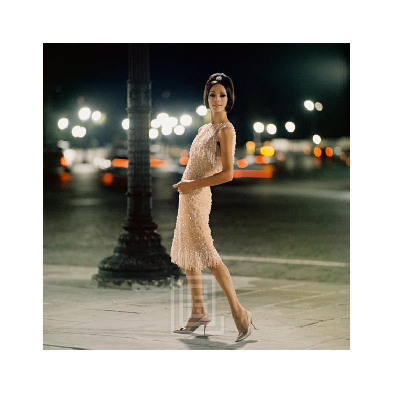 Mark Shaw Color Photograph - Dior, Model in Peach Sequins, Ciel de Feu, 1961