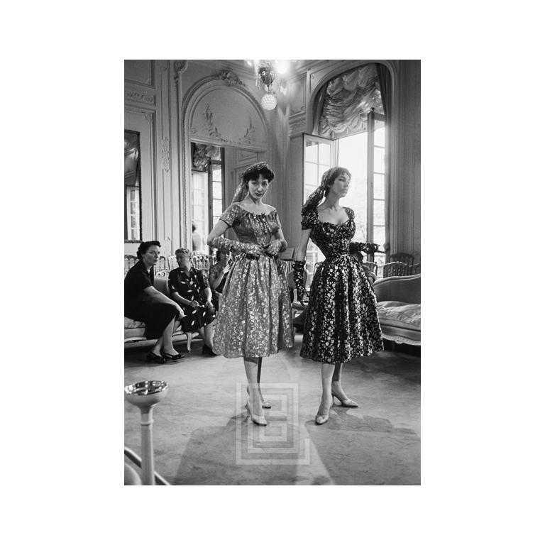 Mark Shaw Black and White Photograph - Dior Salon, Two Models wearing Metallic Dresses, 1953