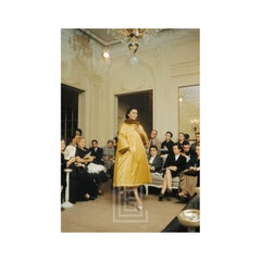 Dior Salon with Alla in Yellow Satin Artamene coat, 1954