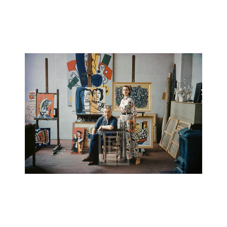 Mark Shaw Color Photograph - Fernand Leger in Studio, Anne Gunning wearing McCardell's design of Leger's work