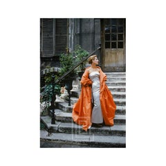 Givenchy Rust Cape in Courtyard, 1955