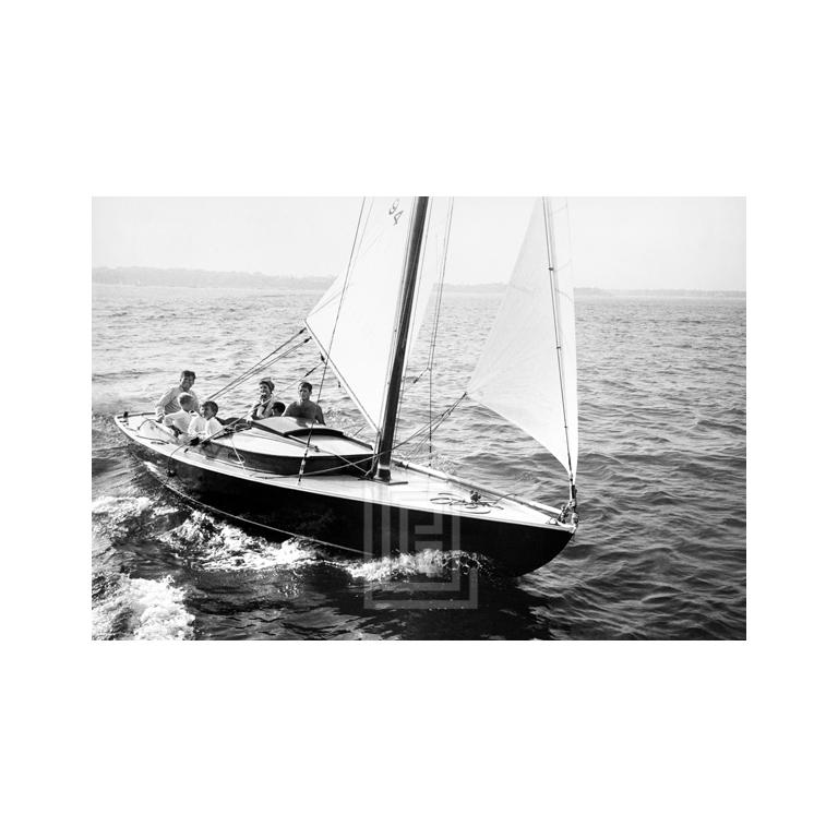 Mark Shaw Figurative Photograph - Kennedy, Family Sailing Nantucket Sound, Front of Boat, 1959