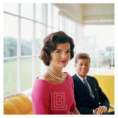 Kennedy, Jackie in Pink with JFK in Yellow Room, Angle, 1959