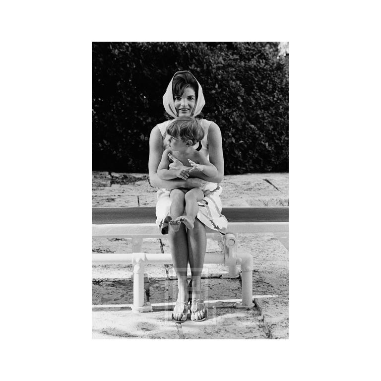 Figurative Photograph Mark Shaw - Kennedy, Jackie with John, Jr. in Lap, B&W, Palm Beach