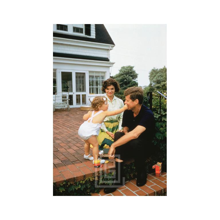 Mark Shaw Color Photograph - Kennedy, John F. and Jackie and Caroline on Patio, 1958