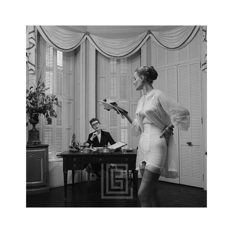 Mark Shaw Figurative Photograph - Lingerie with Secretary, 1952.