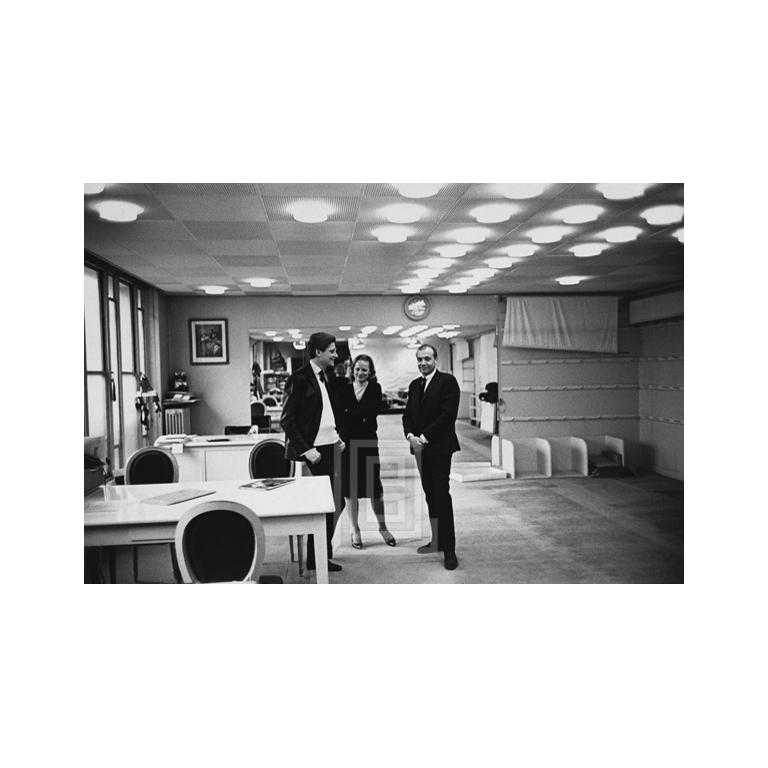 Mark Shaw in Showroom with Yves St. Laurent, Wide Image size is 13.75" x 20" (for 17" x 22" paper size). All Mark Shaw prints are made to order in limited editions on Hahnemuhle photo rag paper. Each print is Estate stamped on the back and signed