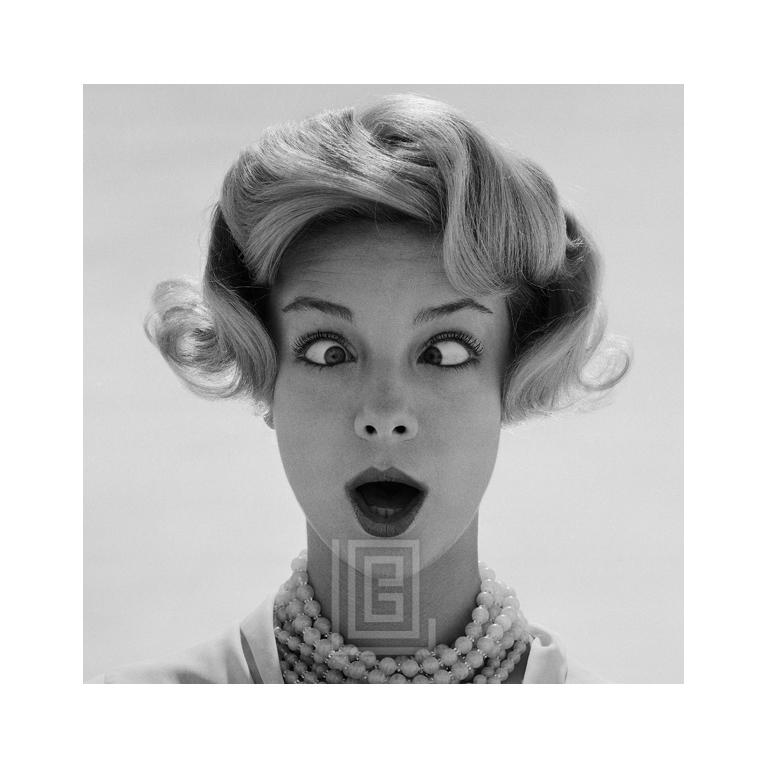 Mark Shaw Portrait Photograph - Mod Girl, Playfully Crossing Eyes, Close Up, 1958