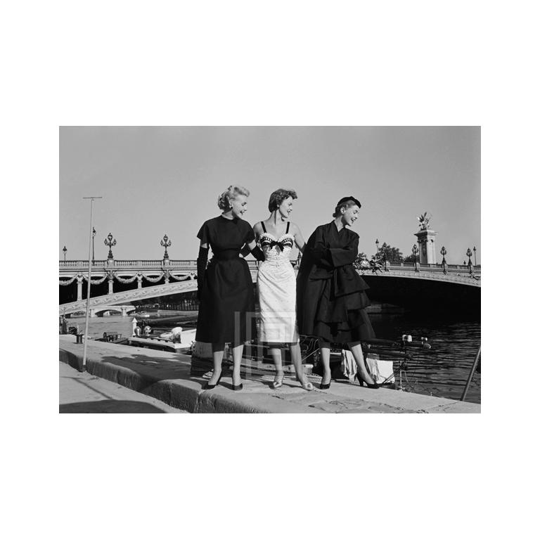 Mark Shaw Black and White Photograph - Paris, Dior Three Girls Look Left, 1953
