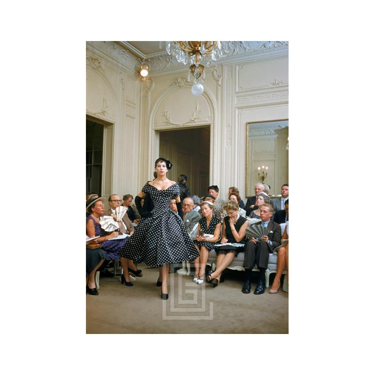 Mark Shaw Figurative Photograph - Salon Dior Polka Dot Dress, 1954