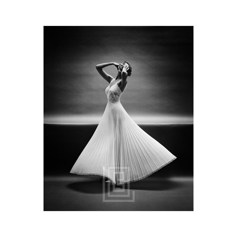 Mark Shaw Black and White Photograph - Vanity Fair Pleated Standing Triangle, Circa 1955