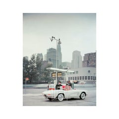 Used White Corvette at Gas Station, Day, Circa 1960