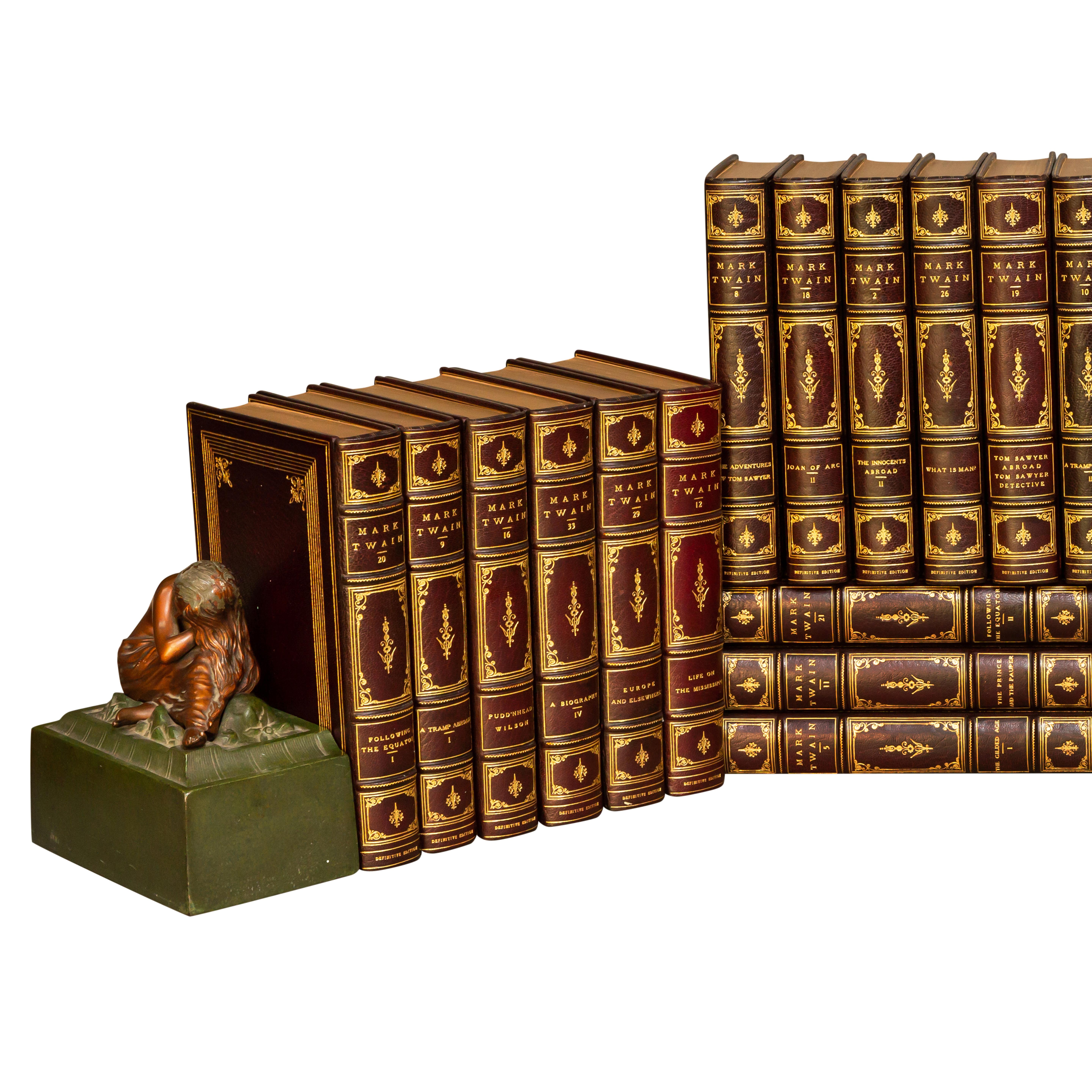 37 Volumes. 
“Definitive Edition” Limited to 1024 Sets, The First Volume of Each bearing the original autograph signature of Mark Twain, This is #855.
Bound in full wine Morocco, top edges gilt, raised bands, gilt on covers and spines,
Marbled
