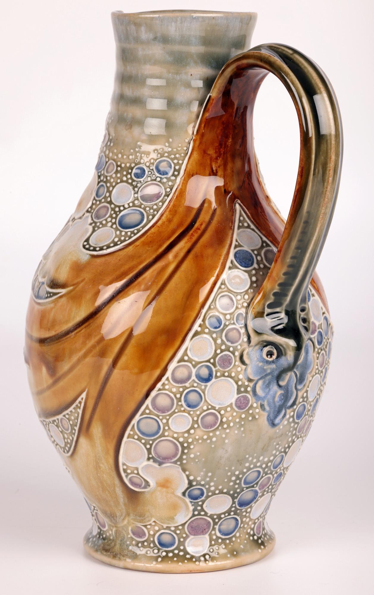 Late 19th Century Mark V Marshall Doulton Lambeth Mask Jug with Scrolling Leaves