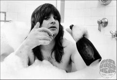 Ozzy Osbourne in bath, 1981 by Mark Weiss