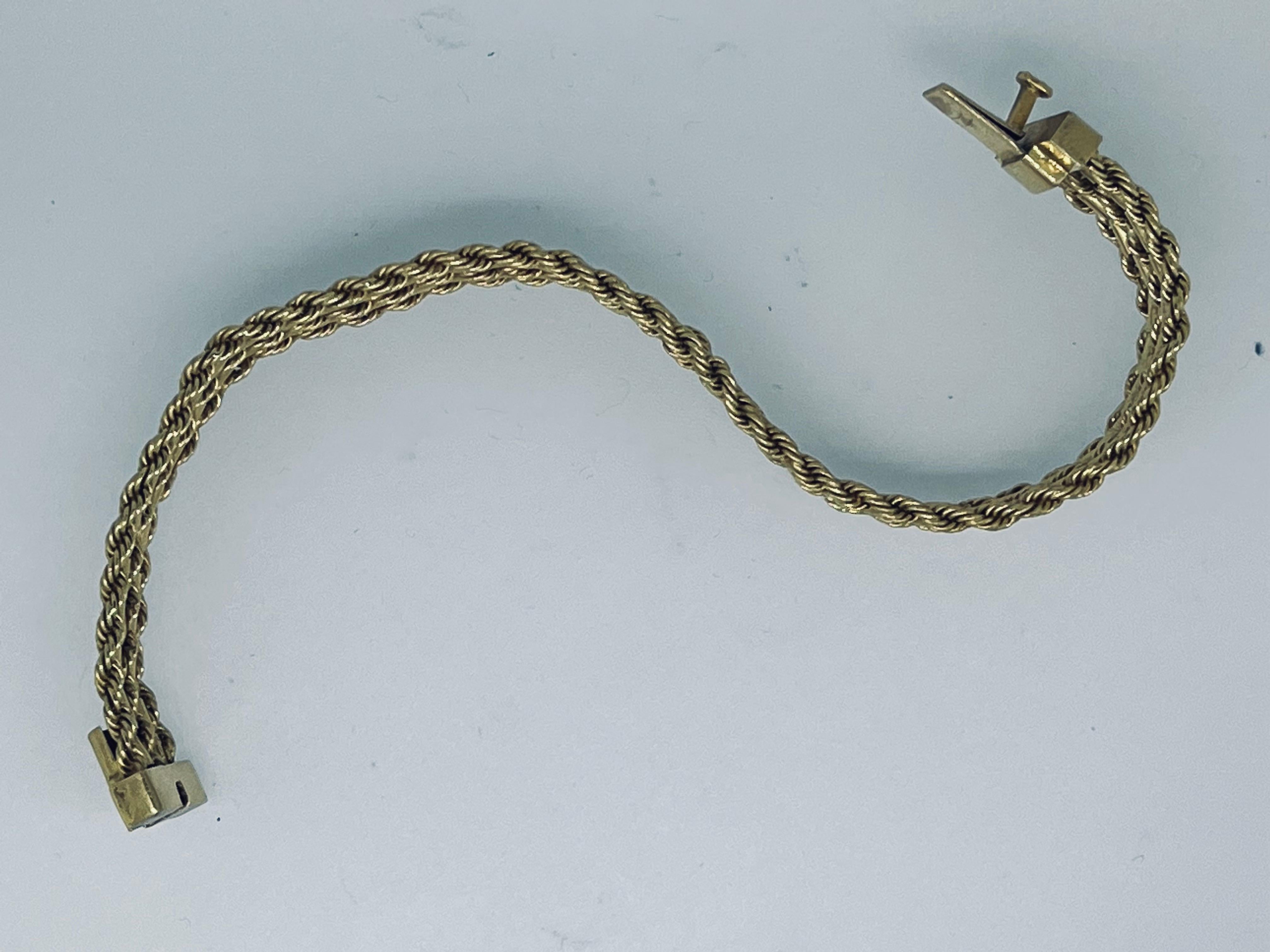 Marked 18 Carat Three Row Rope Gold Italian Bracelet, Circa 1960s  In Excellent Condition For Sale In London, GB