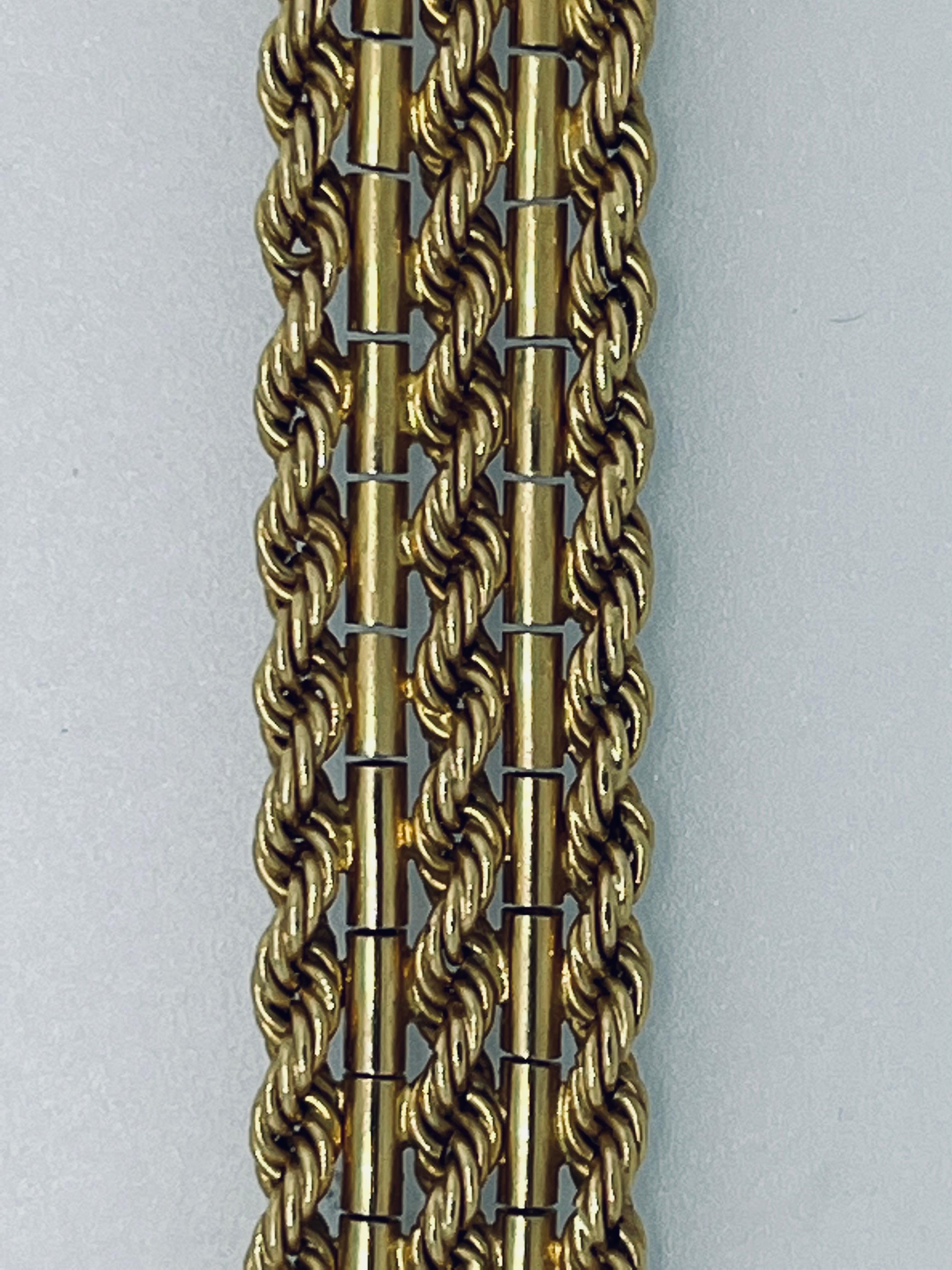Women's Marked 18 Carat Three Row Rope Gold Italian Bracelet, Circa 1960s  For Sale