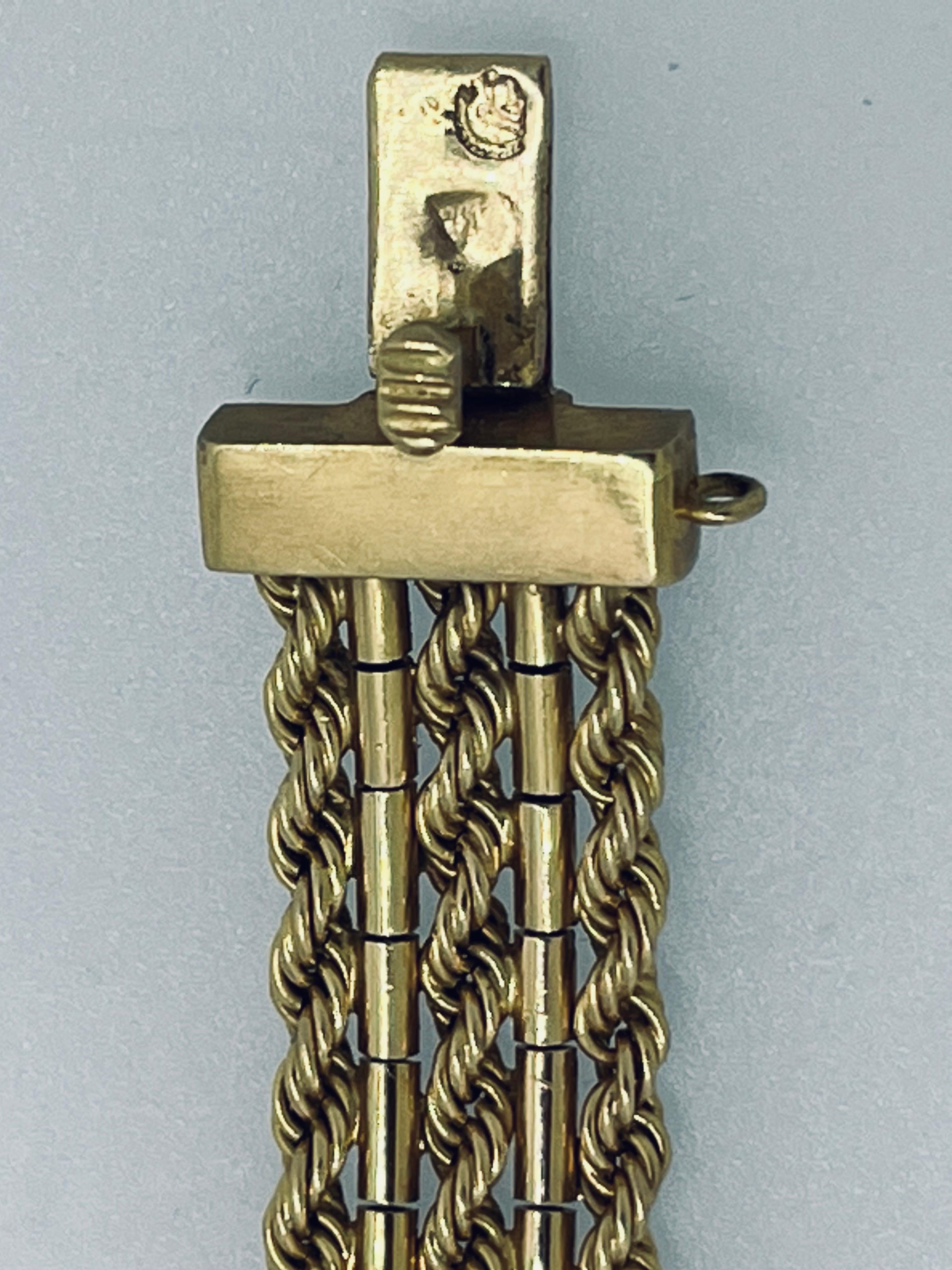 Marked 18 Carat Three Row Rope Gold Italian Bracelet, Circa 1960s  For Sale 1