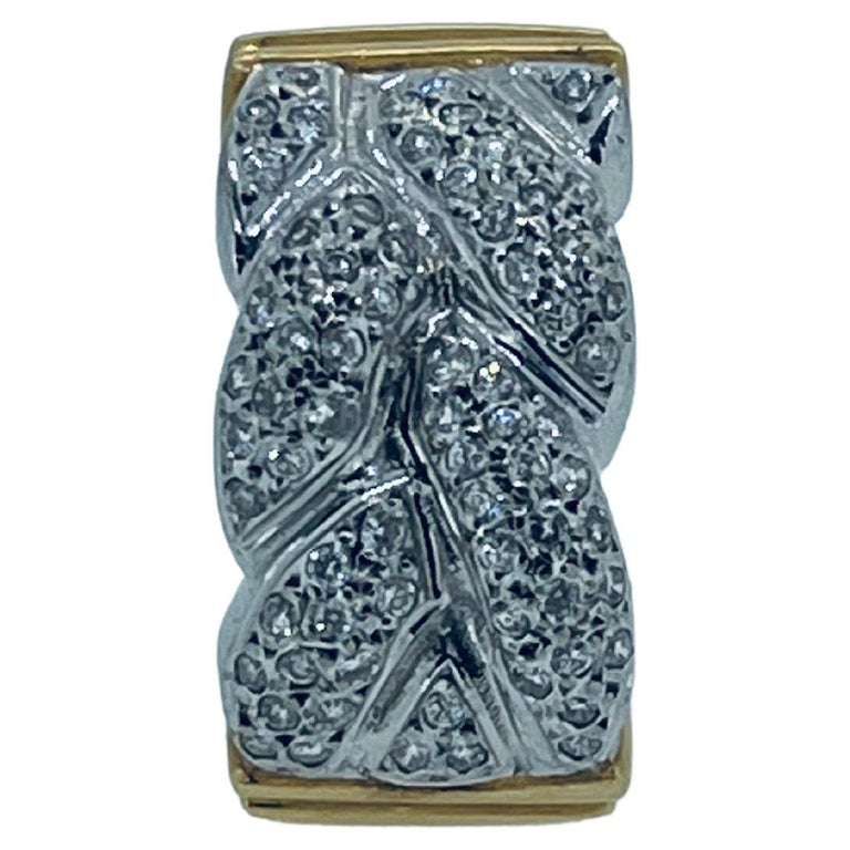 Marked 18K, 70 diamonds set rope ring in white and yellow gold, circa ...