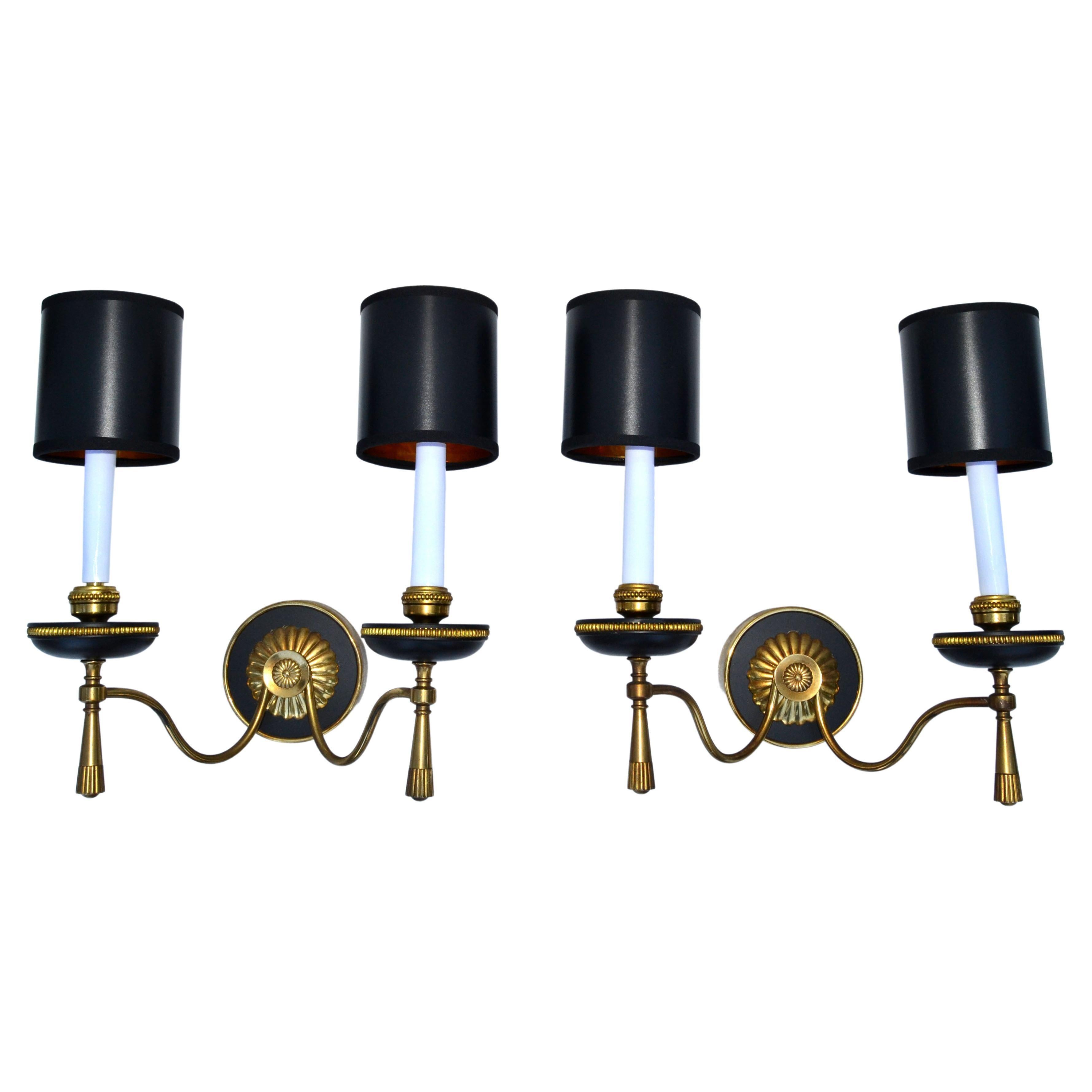 Pair of Mid-Century Modern two light Gaetano Sciolari wall sconces made out of two Patina Bronze and come with Black and Gold Paper Shades.
Each sconce takes 2 light bulbs with max. 40 watts.
Round back plate measures: 4.5 inches.
Projection of